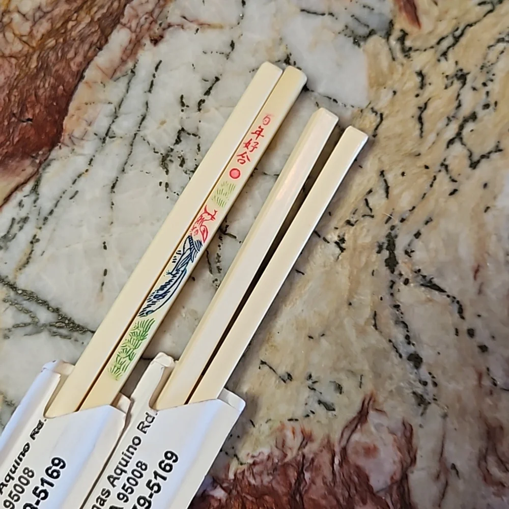 **SALE**  2 pair plastic chop sticks